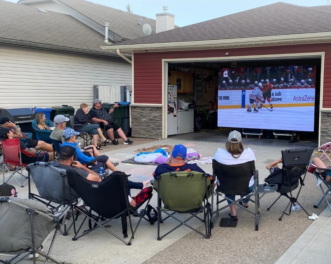 An outdoor home screening with an iAVi video wall